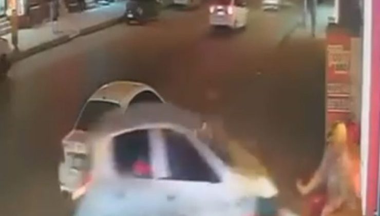İş yerinin duvarına çarpan otomobilin altında kalmaktan kıl payı kurtuldu
