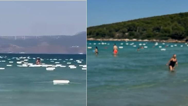 Çeşme’de denizden gelen gizem! Yüzlerce kutu deniz yüzeyini kapladı